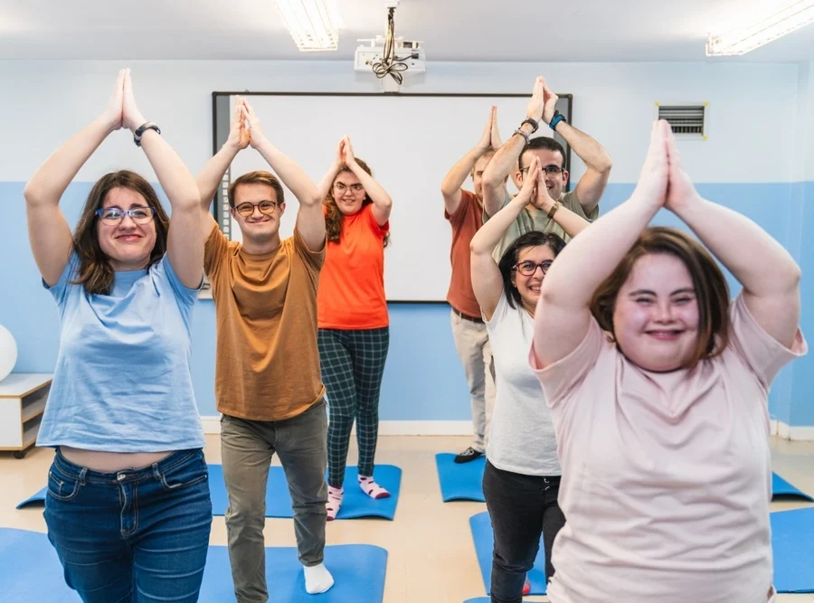 a group yoga session for specially abled individuals